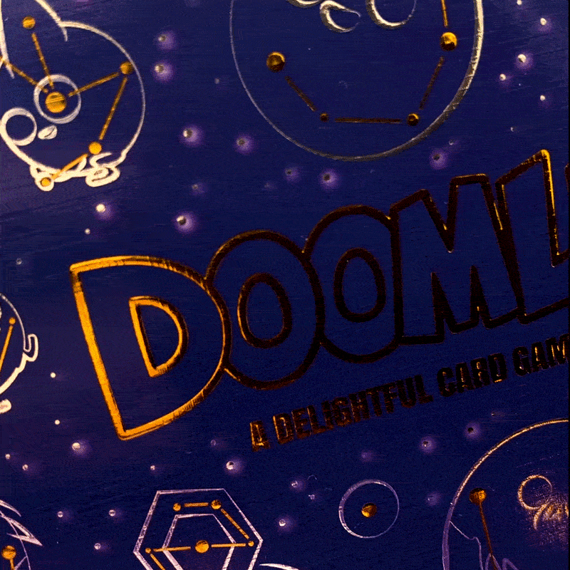 doomlings new 2026 remastered deluxe bundle gold and silver foil