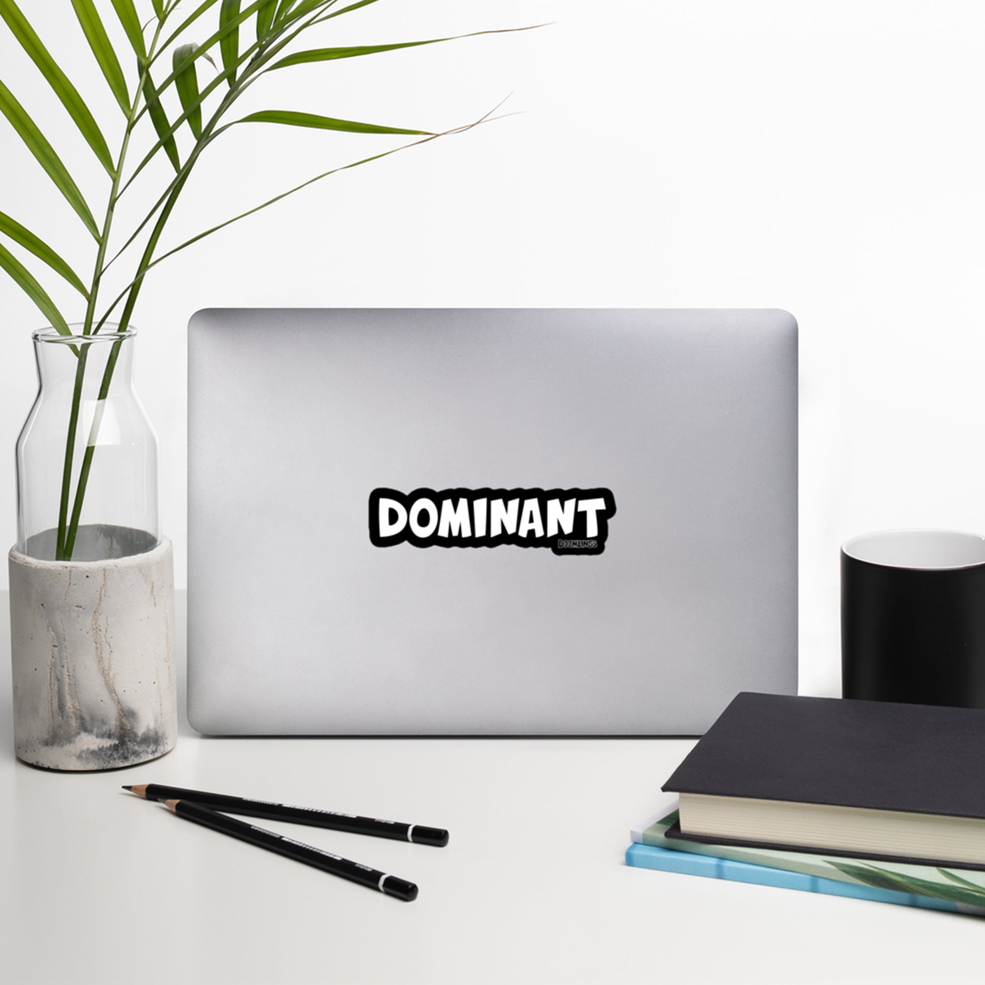 dominant sticker on a laptop