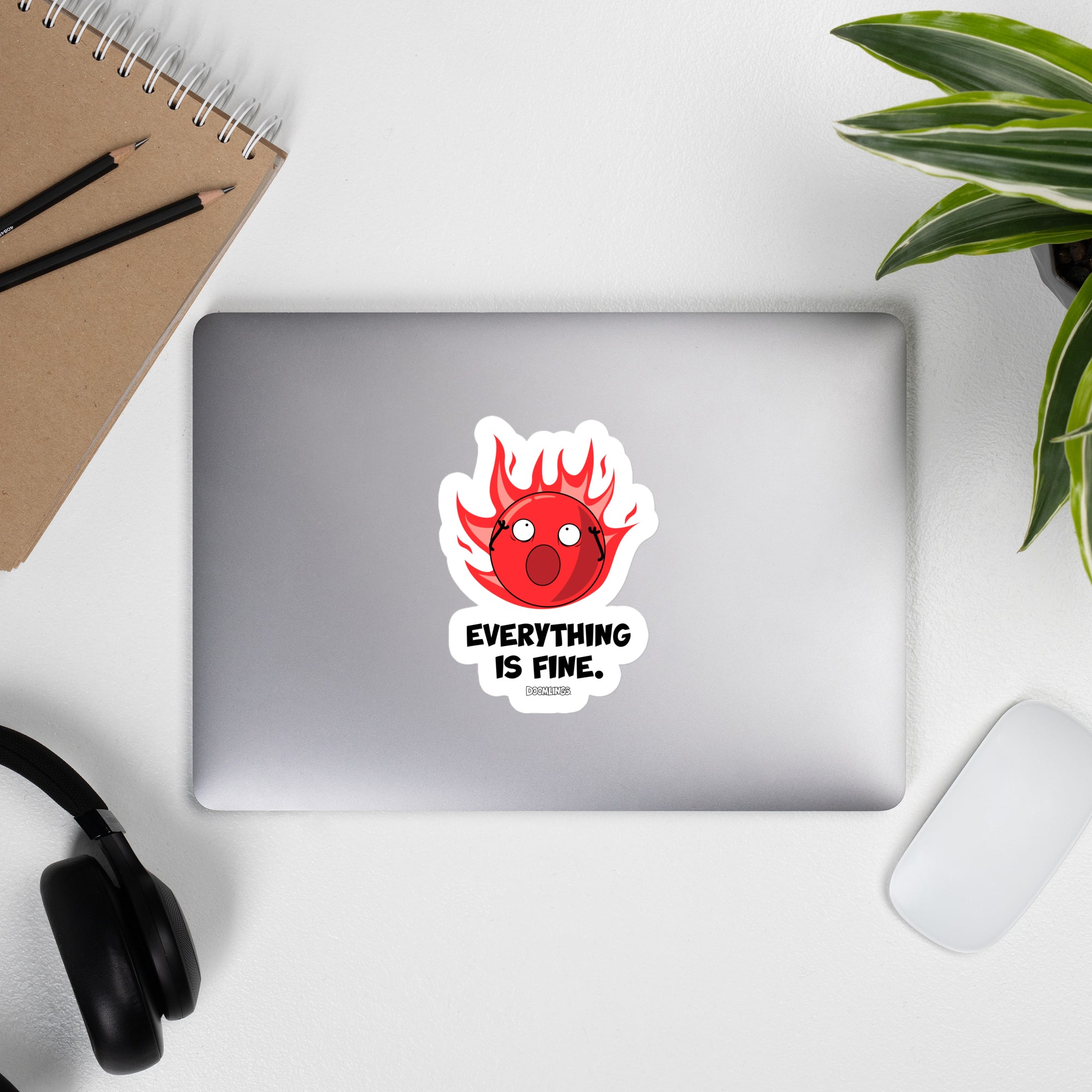 doomling sticker on a laptop